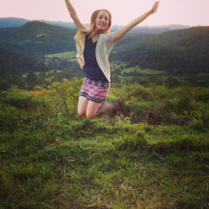 The beautiful view you see behind me is the one we get to see each time we go up or down the mountain!